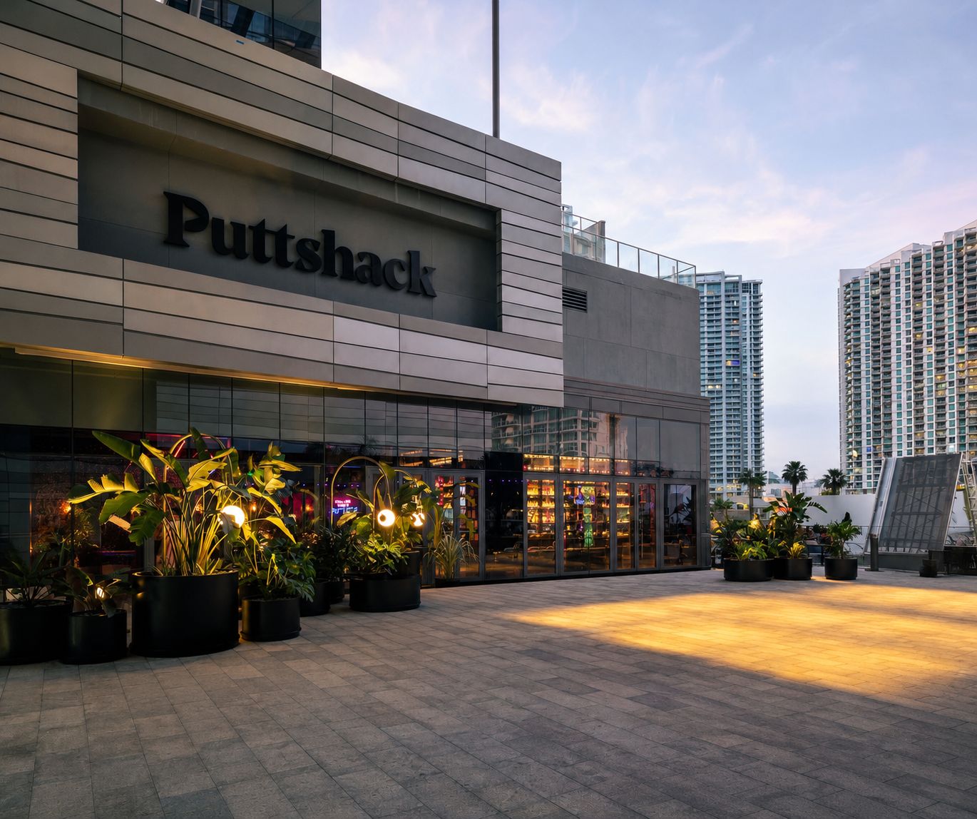 The covered Puttshack terrace overlooking Brickell